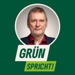 Rundes Portraitfoto von Hans-Jürgen Müller mit einer Sprechblase mit dem Text "GRÜN spricht" auf dunkelgrünem Hintergrund.